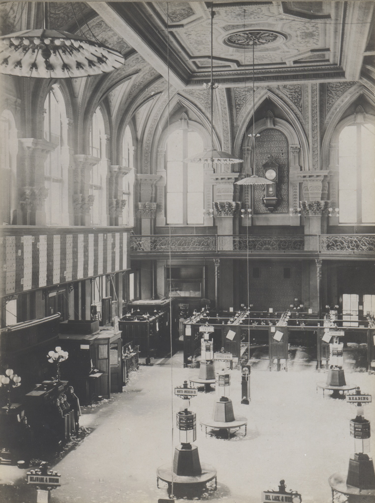 NYSE Trading Floor, 1881 with annuciator board pictured left.